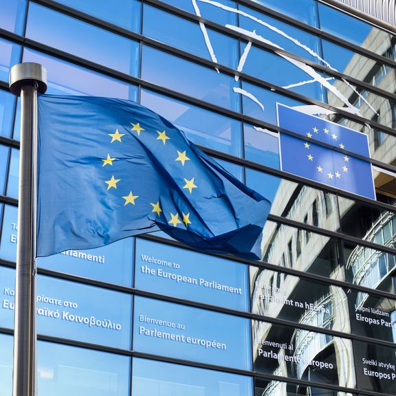 European flag against the European Parliament