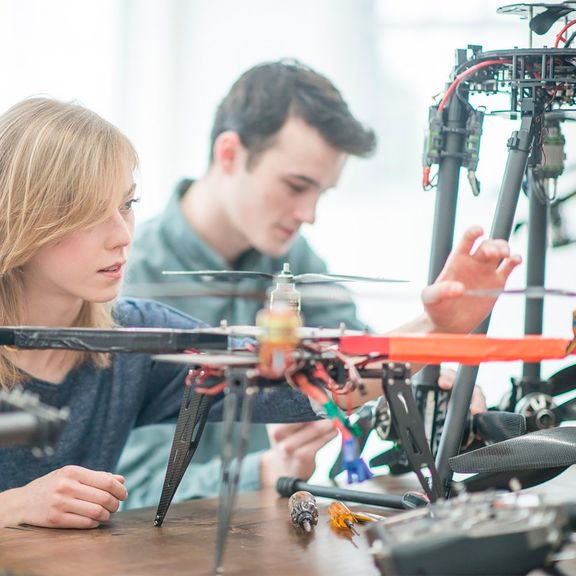 Students work on drones